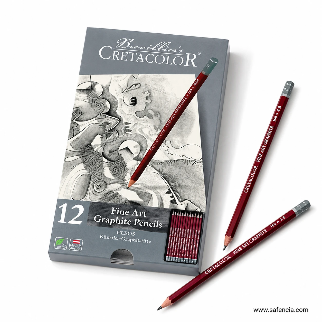 Cretacolor Fine Art graphite pencil box beside loose sharpened red pencils on white background