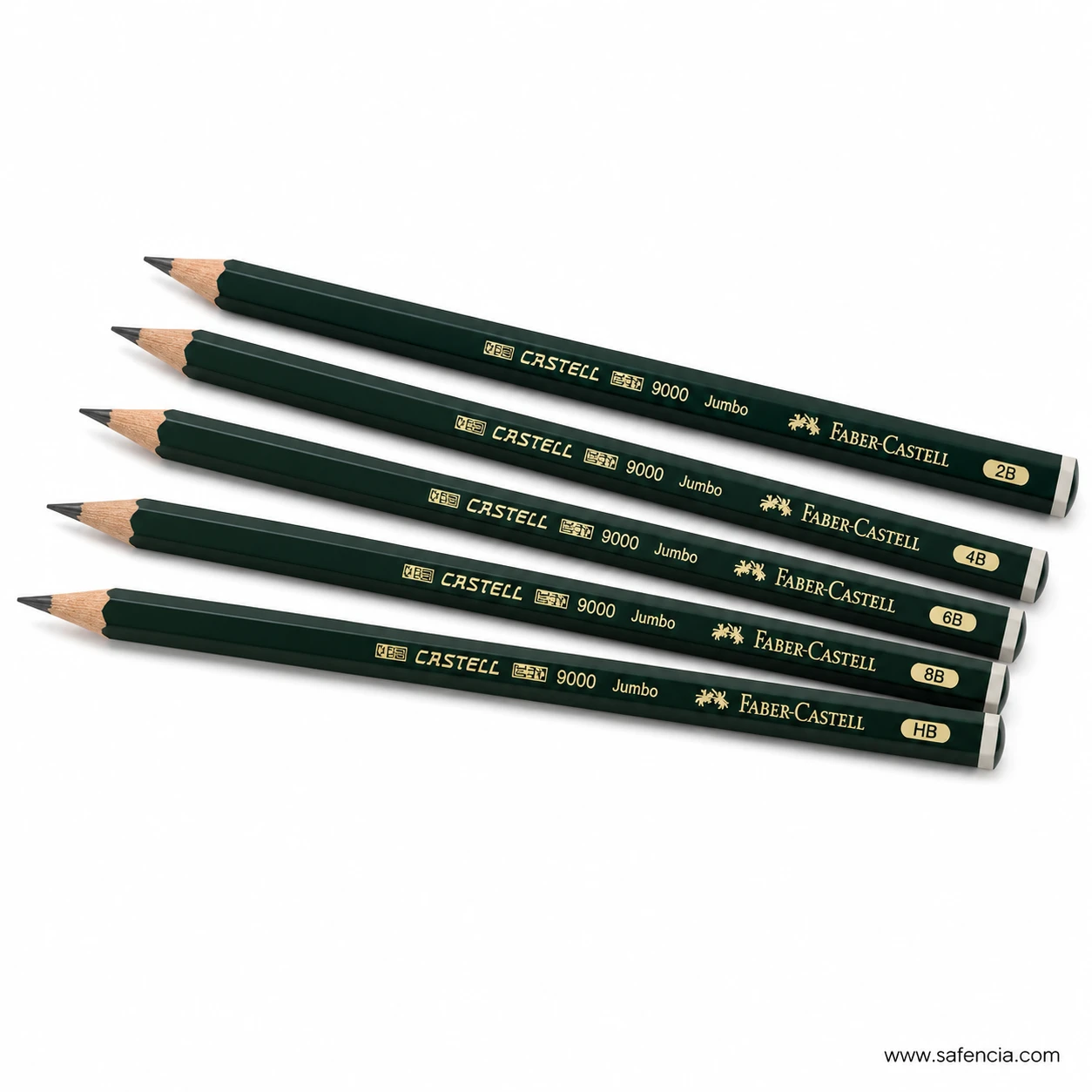 Faber-Castell 9000 graphite pencils in overlapping groups showing sharpened tips and gold barrel printing