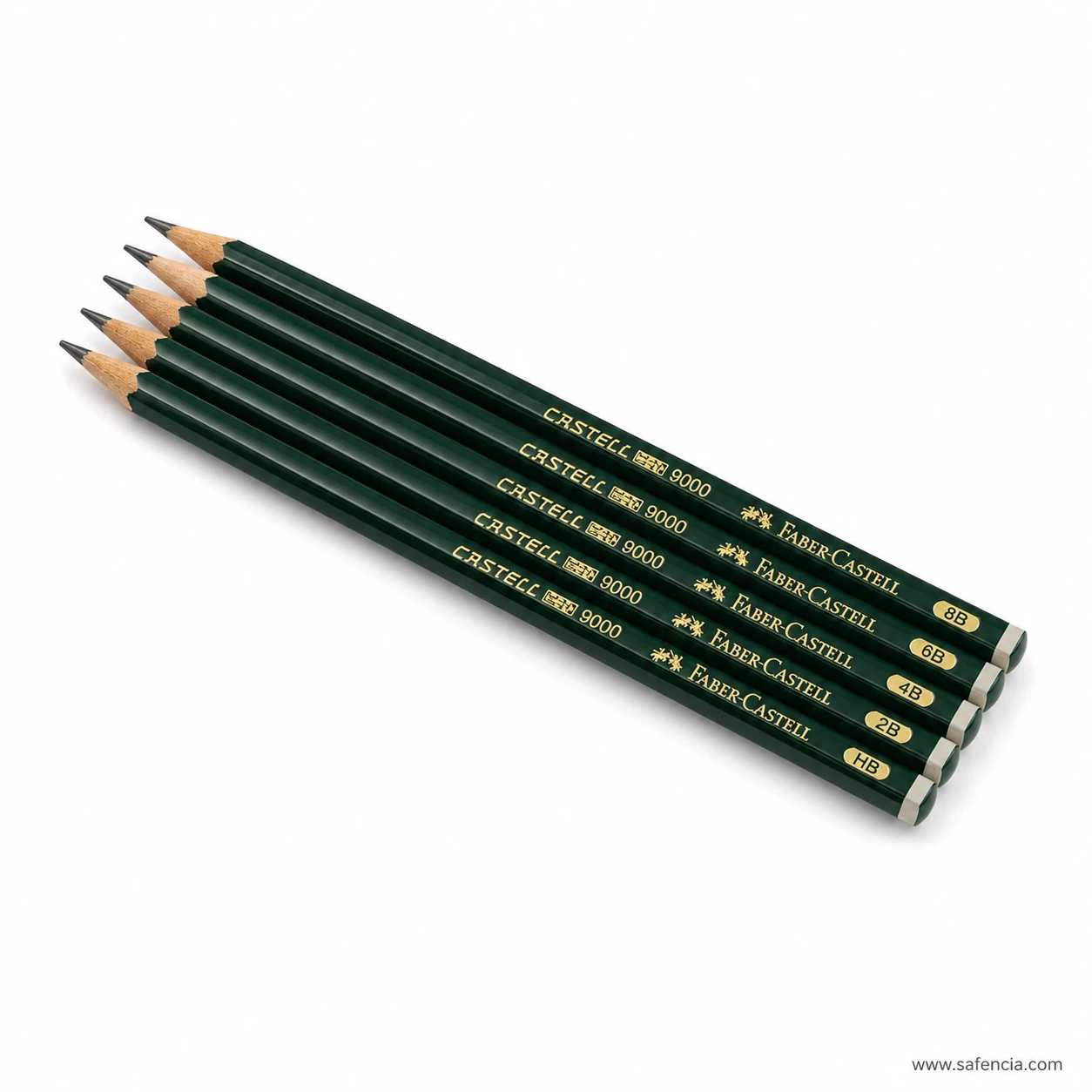 Compact side view of six dark green Castell 9000 graphite pencils with sharpened tips aligned