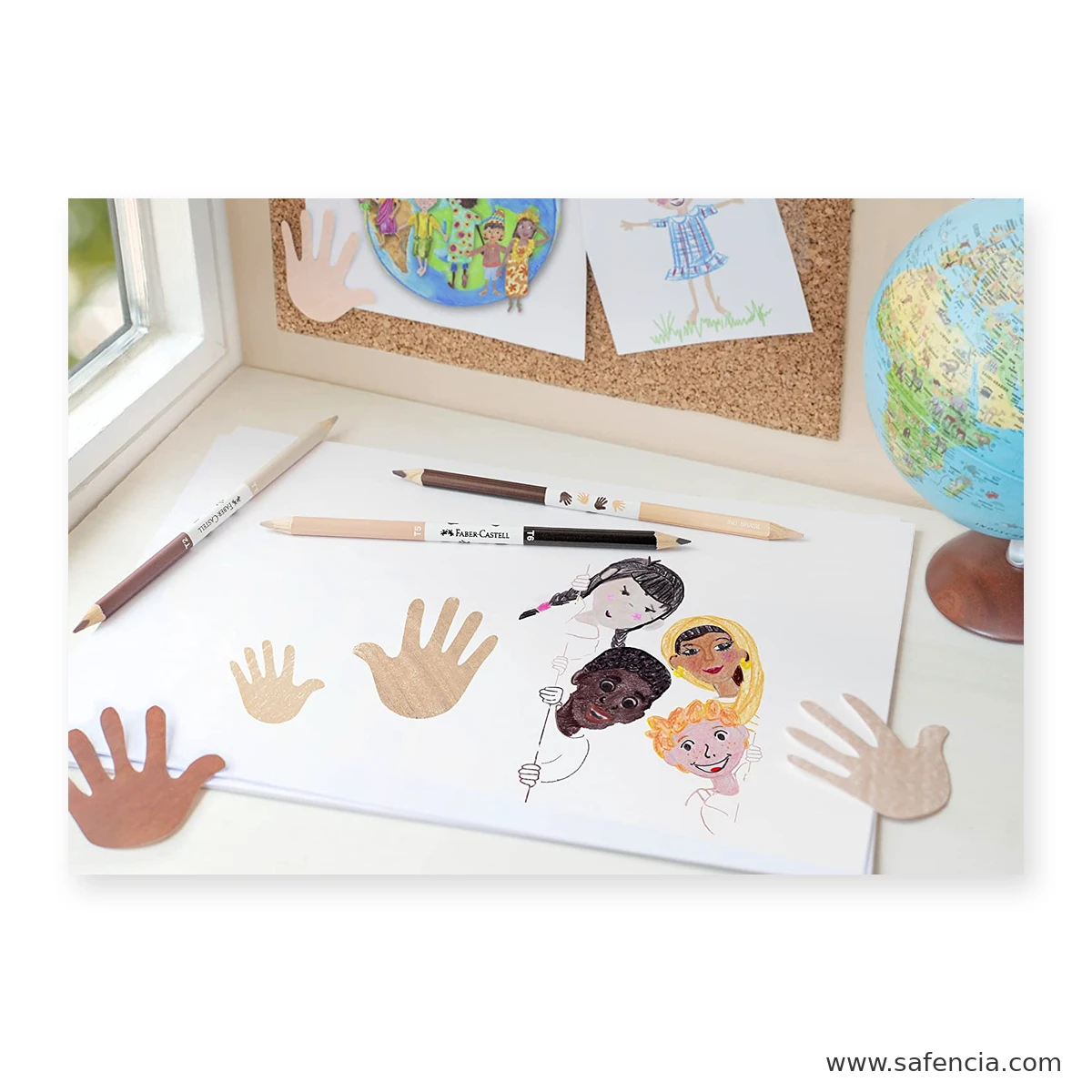 Faber-Castell bicolour skin colour pencils in use on a desk beside a drawing of children with different complexions