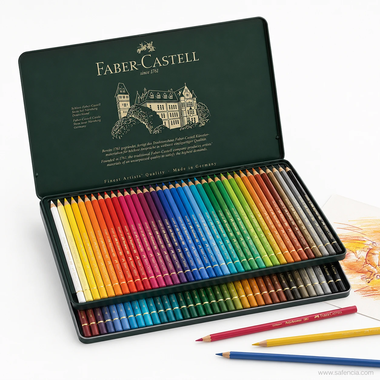 Faber-Castell Polychromos colour pencils 60 tin set open in two fitted layers beside a sketch and three loose pencils