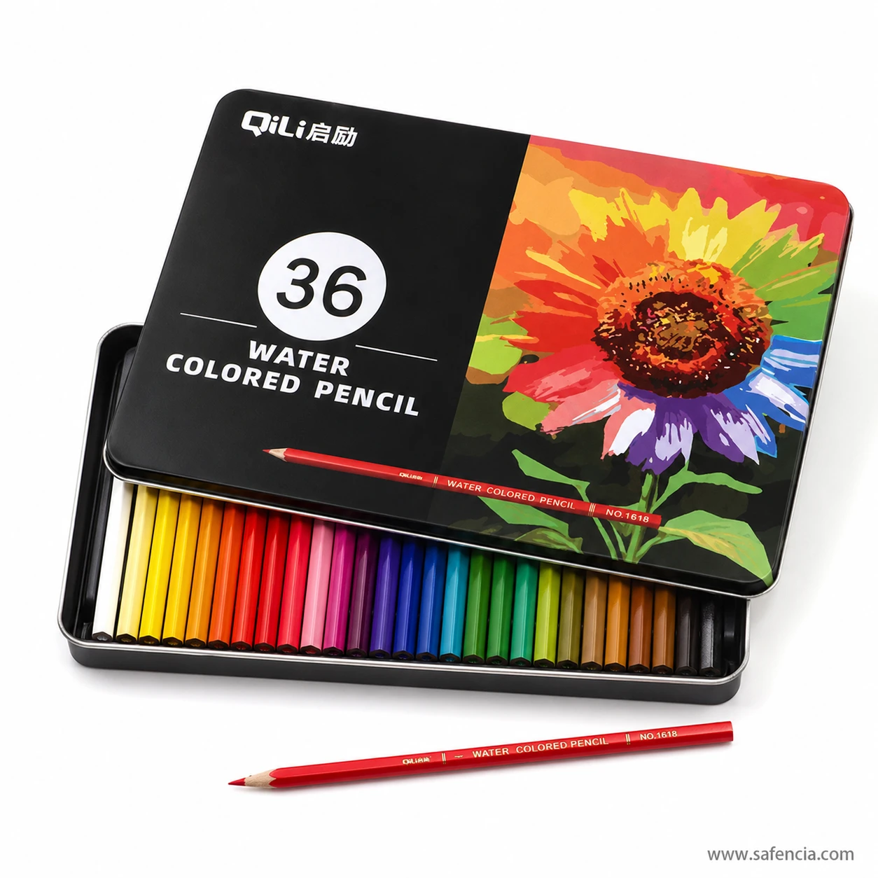 QiLi water coloured pencils metal tin open flat with the fitted tray of colours graded in rows across the case