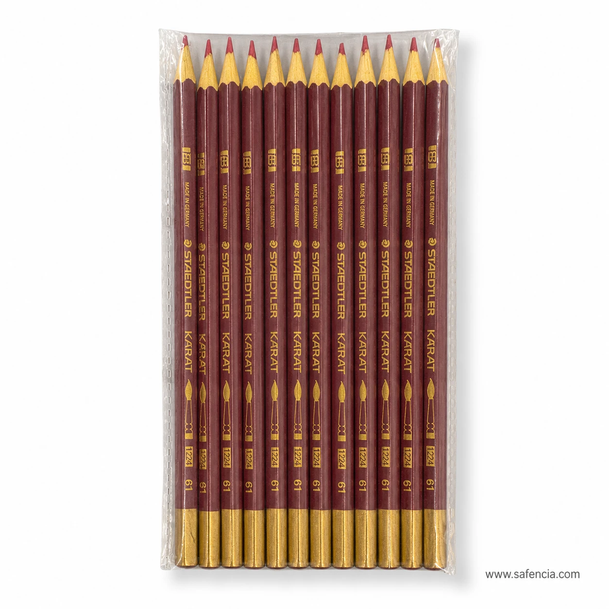 Burgundy medical marking pencils lined up in a plastic sleeve with the soft wax leads visible at the cut points