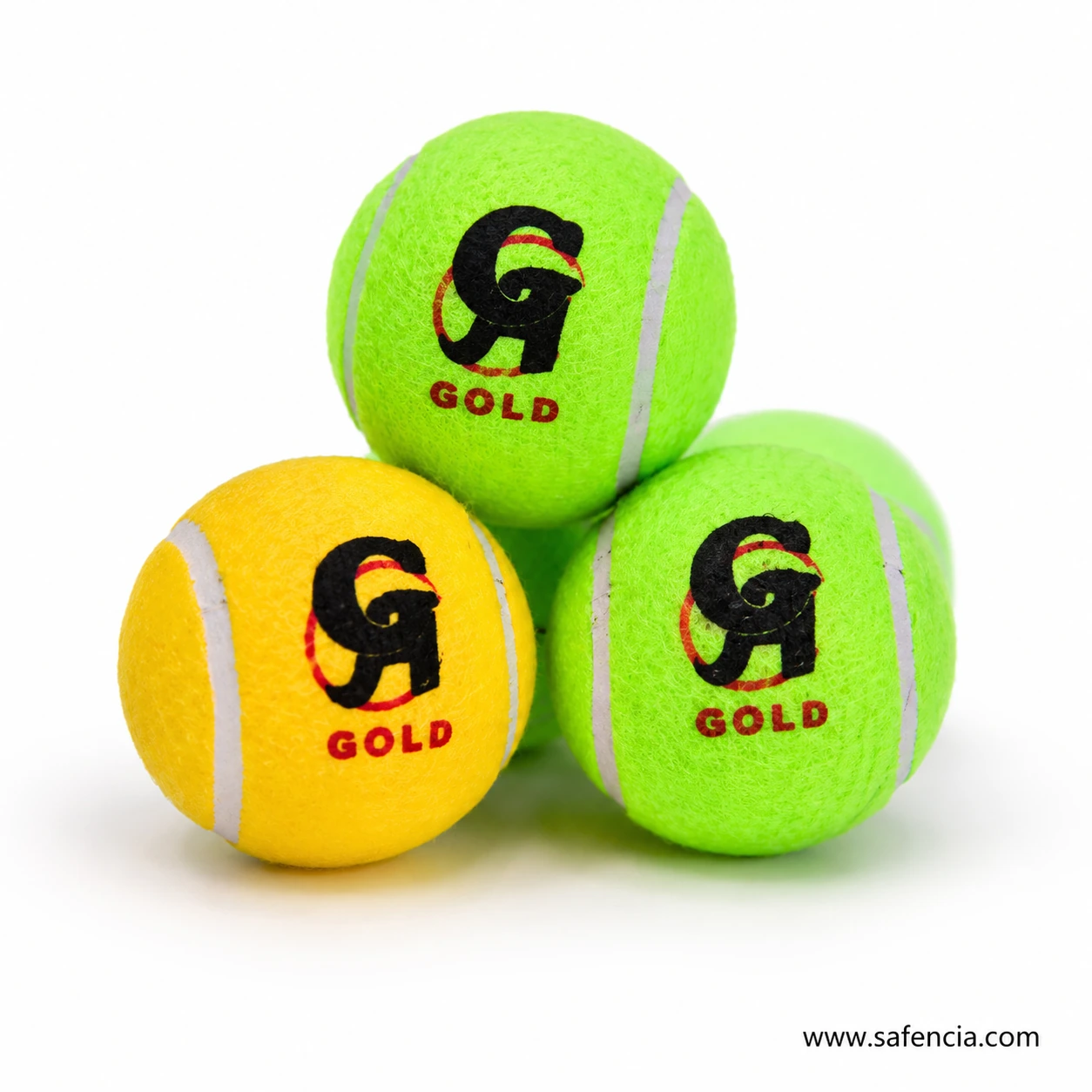 CA Gold cricket tennis balls stacked showing green and yellow colour options