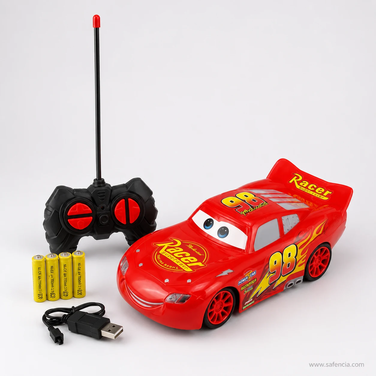 McQueen remote control car box contents with antenna remote, rechargeable AA batteries and USB cable