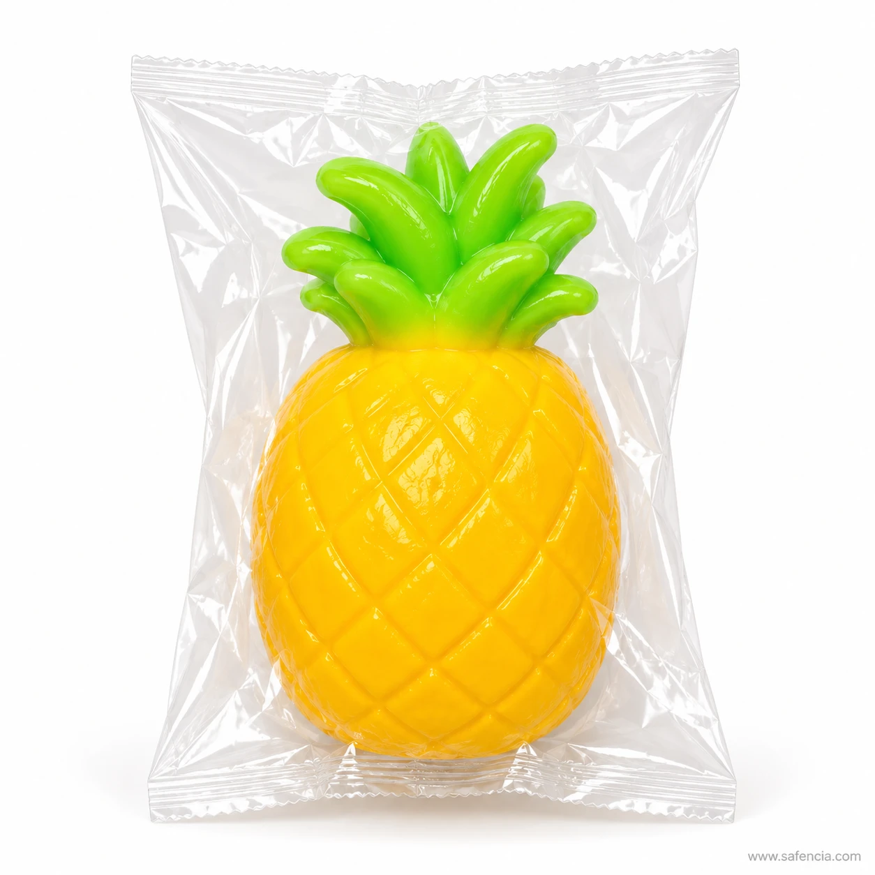 Pineapple fruit squishy sealed inside a clear individual plastic wrapper