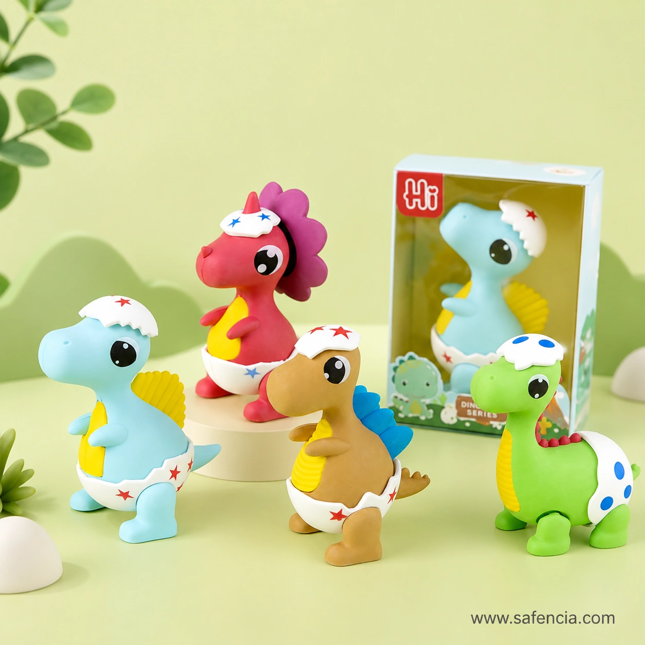 All four baby dinosaur erasers arranged around the windowed Hi display box with its dinosaur-series artwork