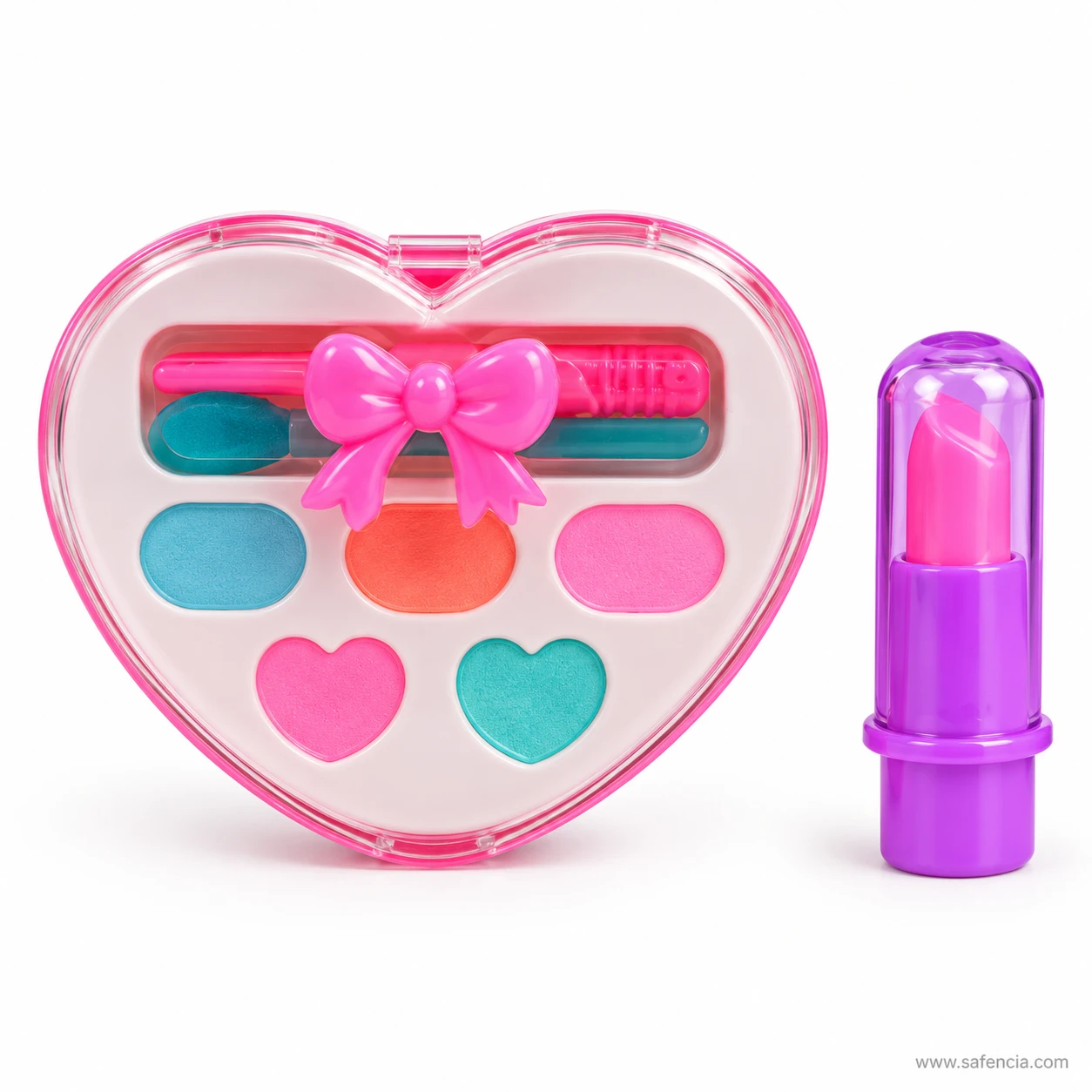 Heart-shaped eyeshadow palette with a pink bow and applicator next to a purple-cased lipstick from the set