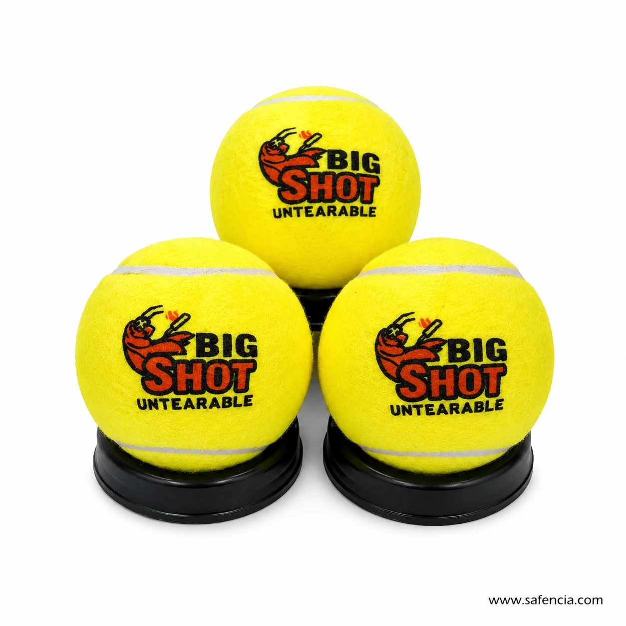 Big Shot 68mm yellow foam cricket balls stacked together on black stands