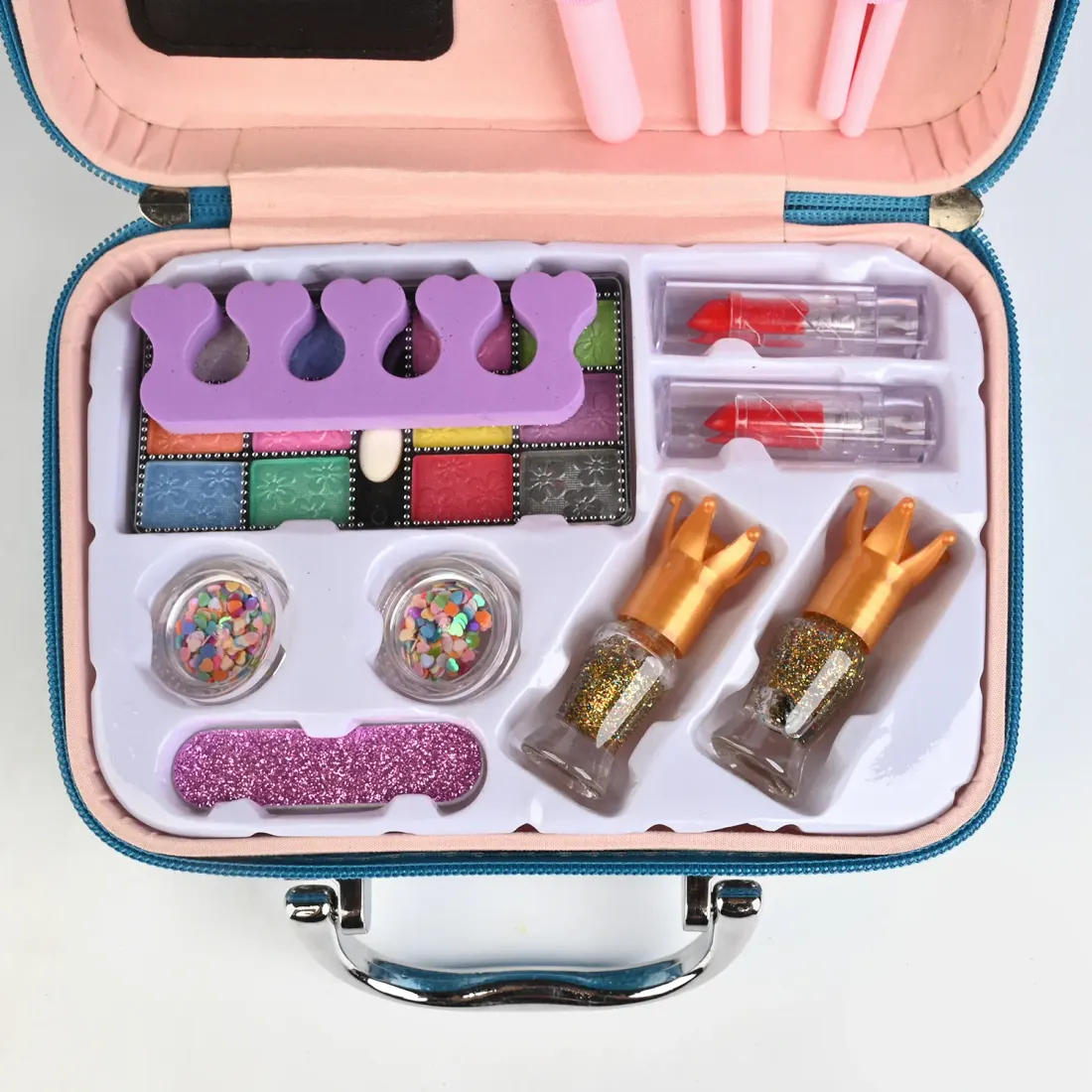 Blue Glitter Makeup Briefcase open view - eyeshadows, blush, glitter, nail polish and brushes