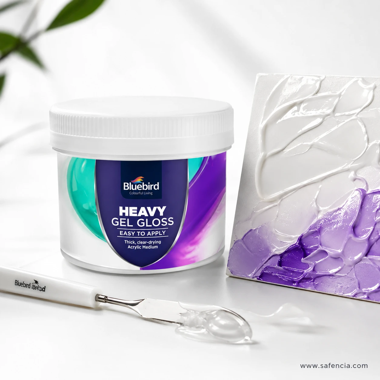 Bluebird Heavy Gel Gloss jar shown next to purple gradient textured canvas board and palette knife