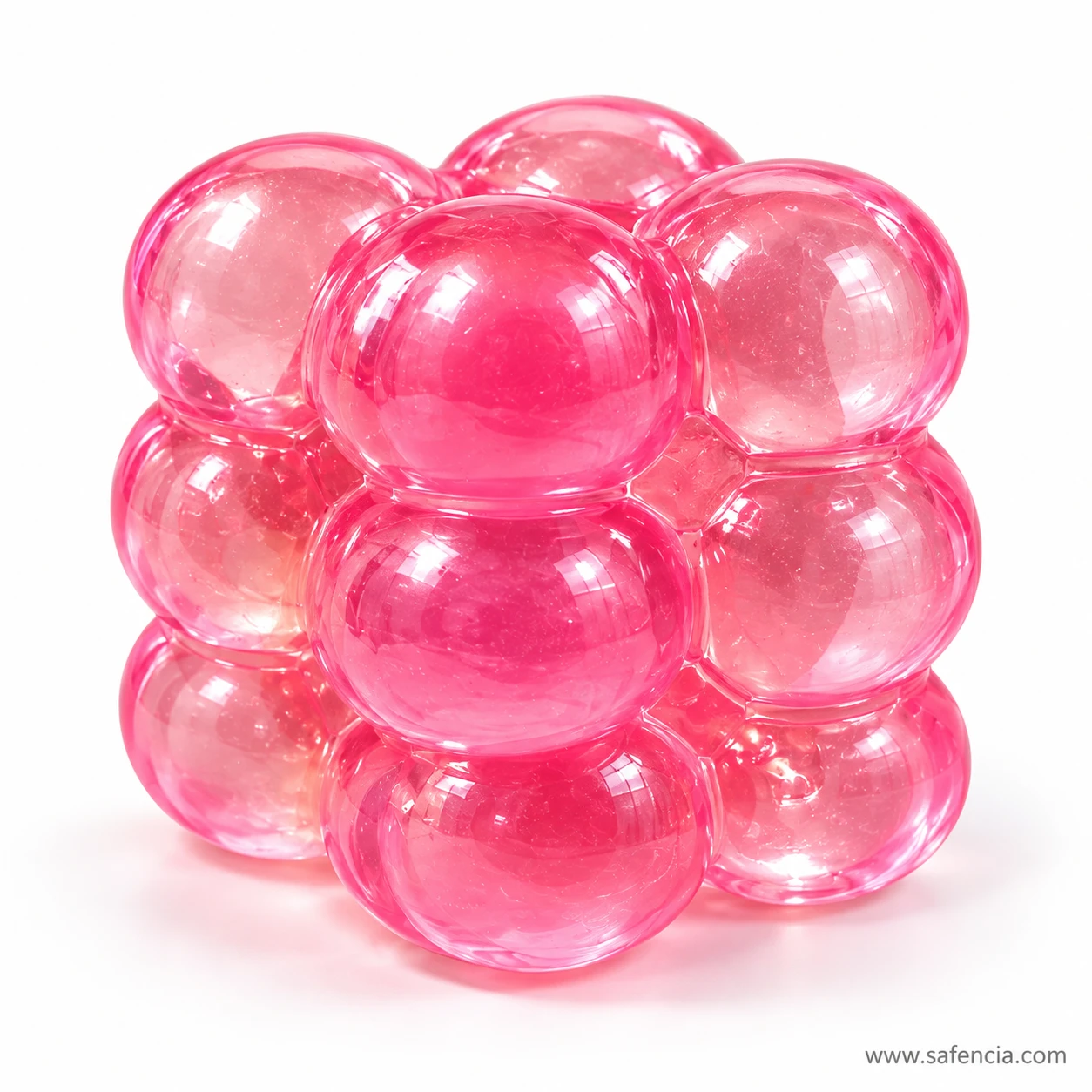 Close view of a translucent pink bubble squishy cube built from rows of glossy rounded bubbles