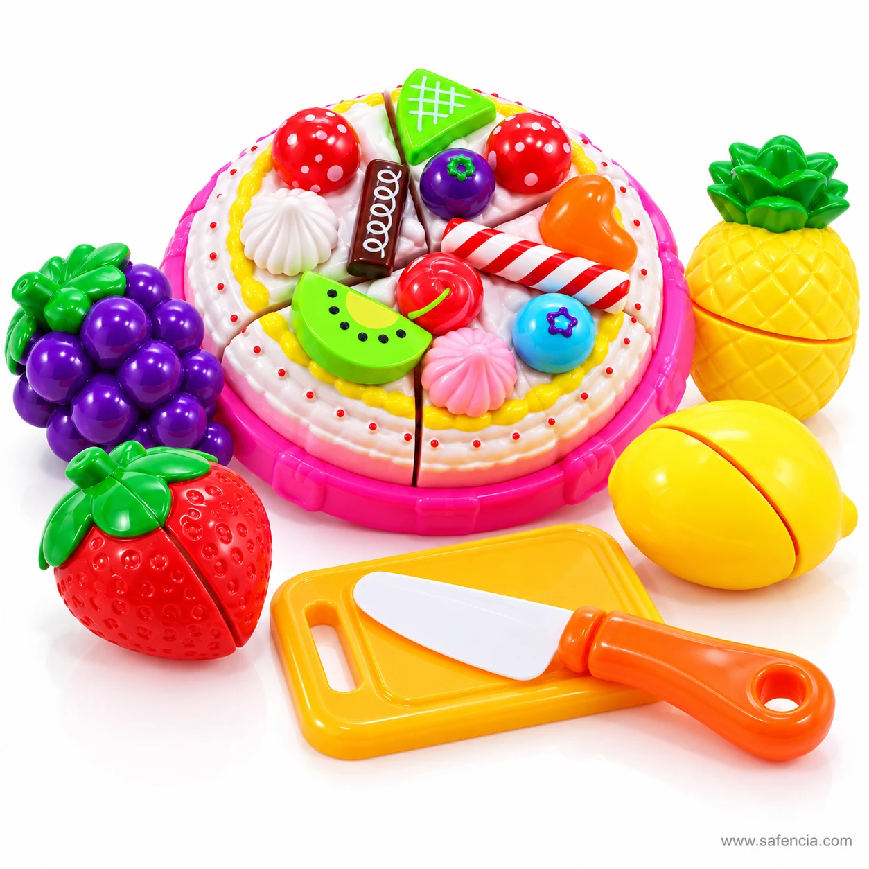 Decorated velcro play cake on a pink base surrounded by grapes, strawberry, lemon, pineapple and the toy knife