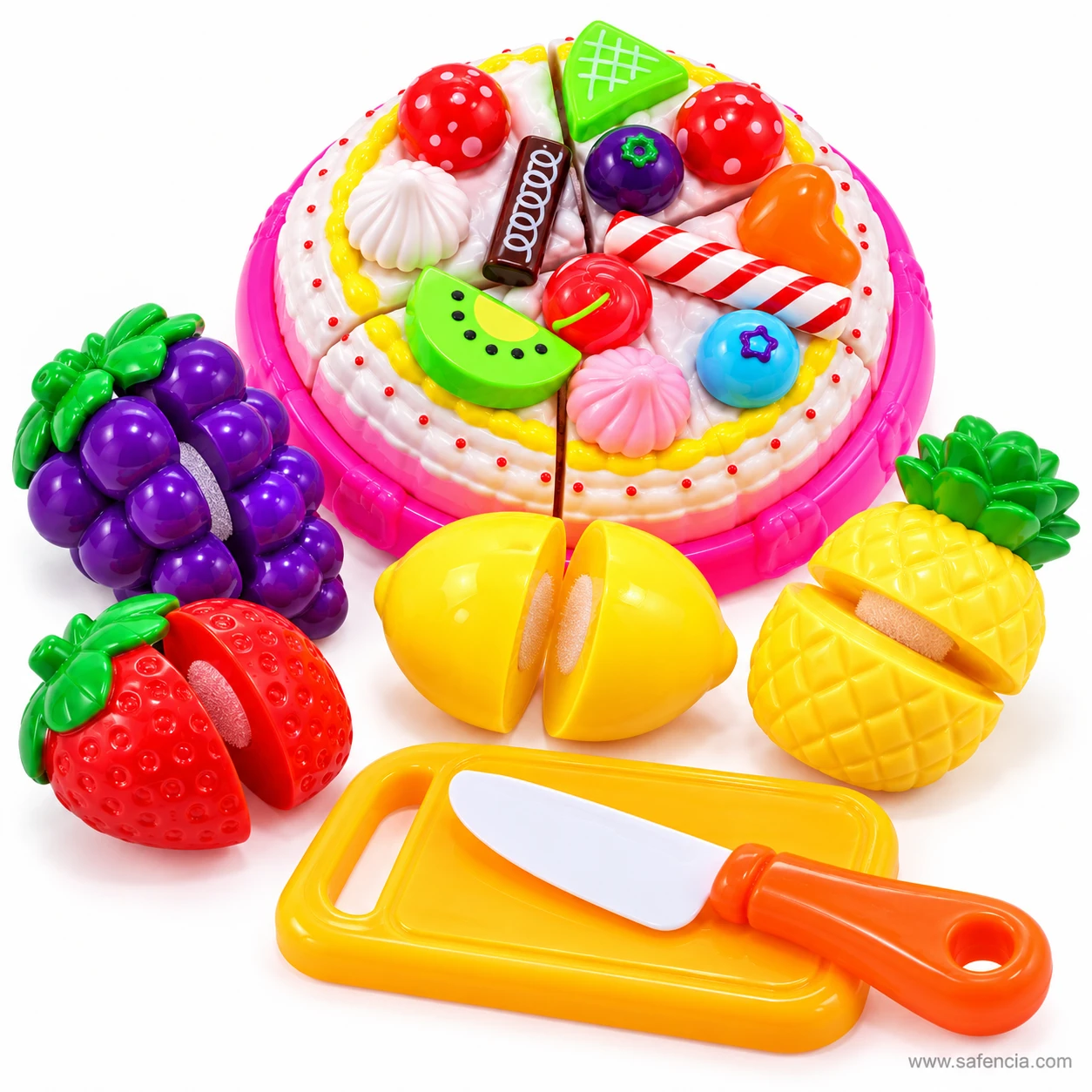 Grapes, strawberry, lemon and pineapple from the cake cutting set split in half to show the velcro inside