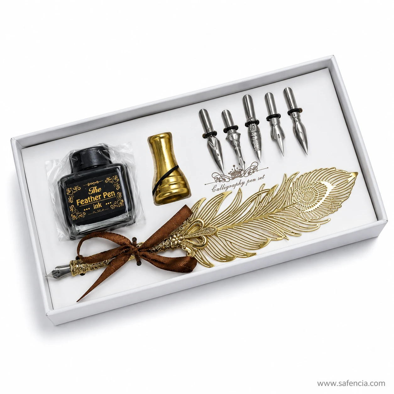 Detail of the calligraphy pen with its cast gold feather head and the steel nib fitted at the writing end
