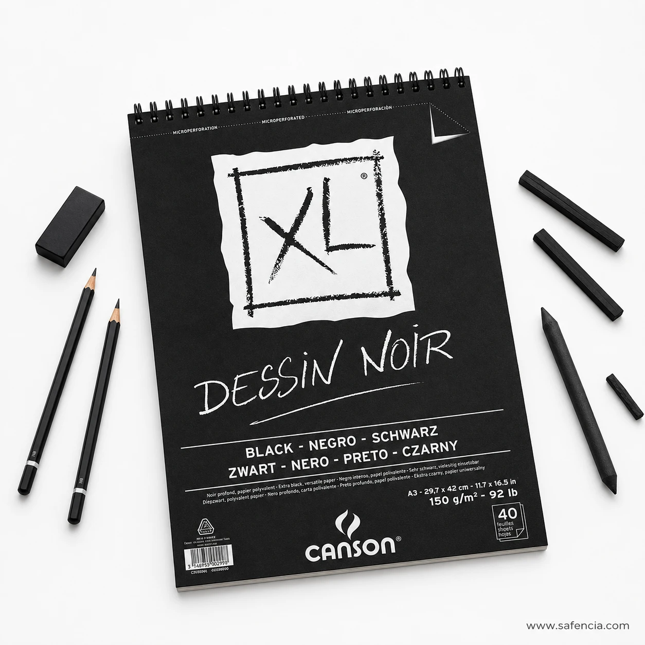Canson XL Dessin Noir pad with drawing pencils, charcoal sticks and eraser