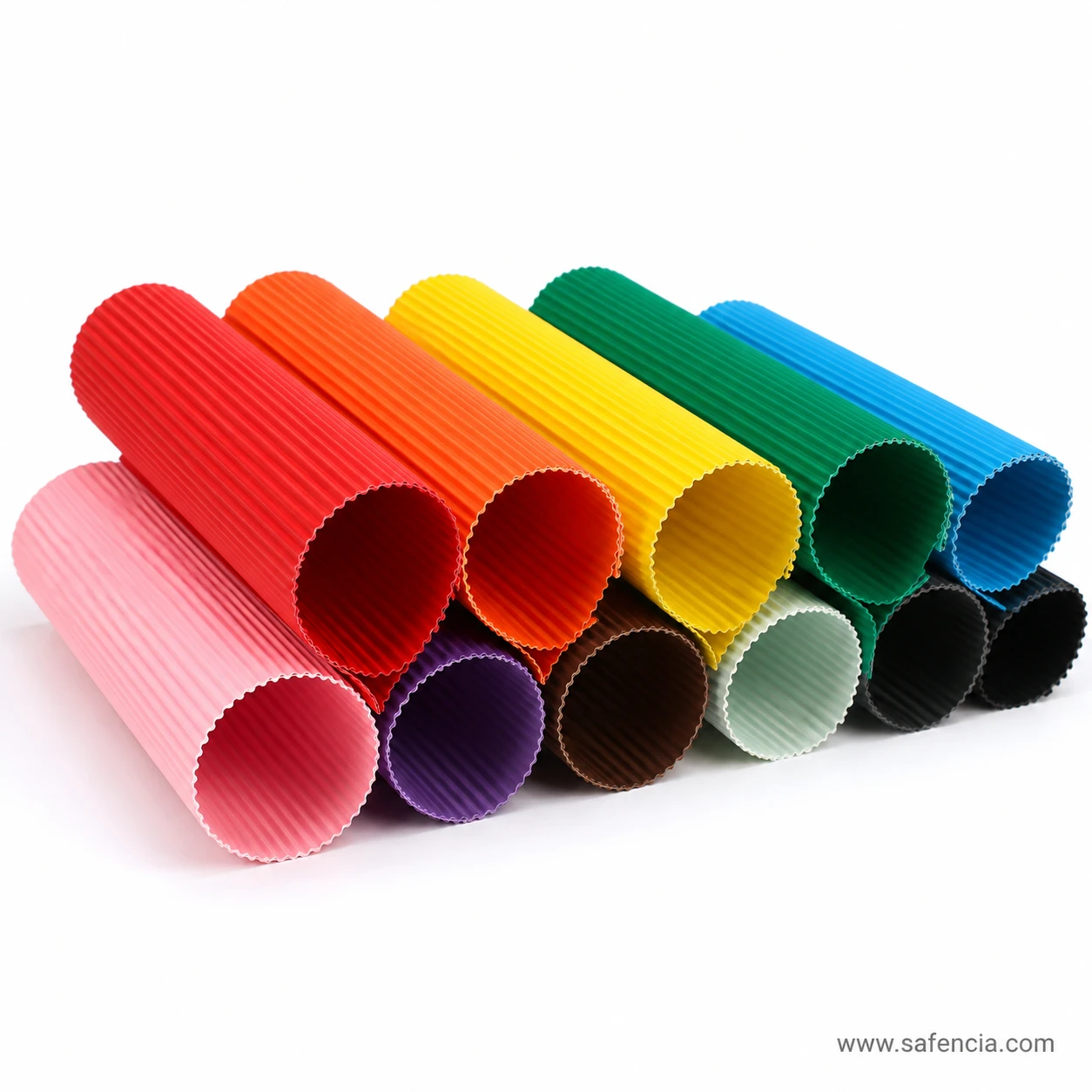 Rolled colorful corrugated craft paper tubes showing flexible 3D fluting