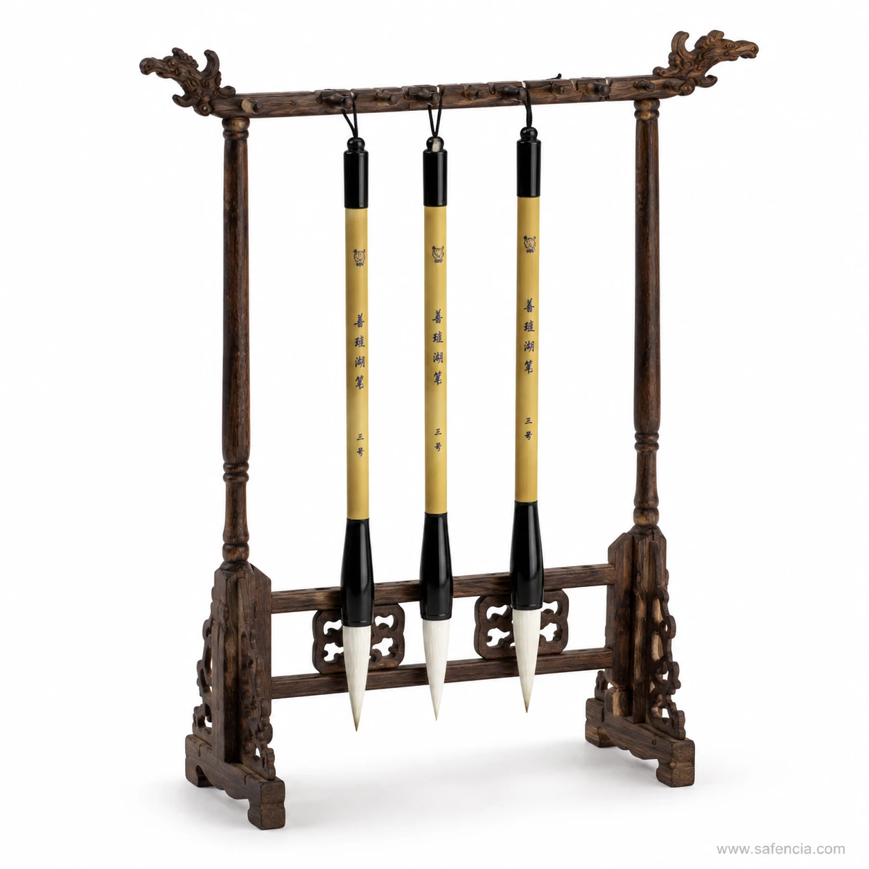 Chinese-style calligraphy brushes resting on an ornate display stand