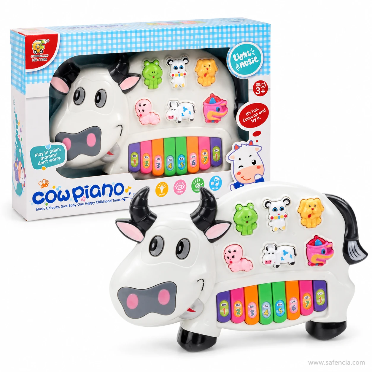 Cow piano keyboard toy set shown in its blue checked window box with a second unit in front