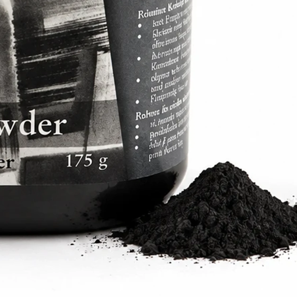 Close view of the 175 g weight mark and the poured charcoal powder texture