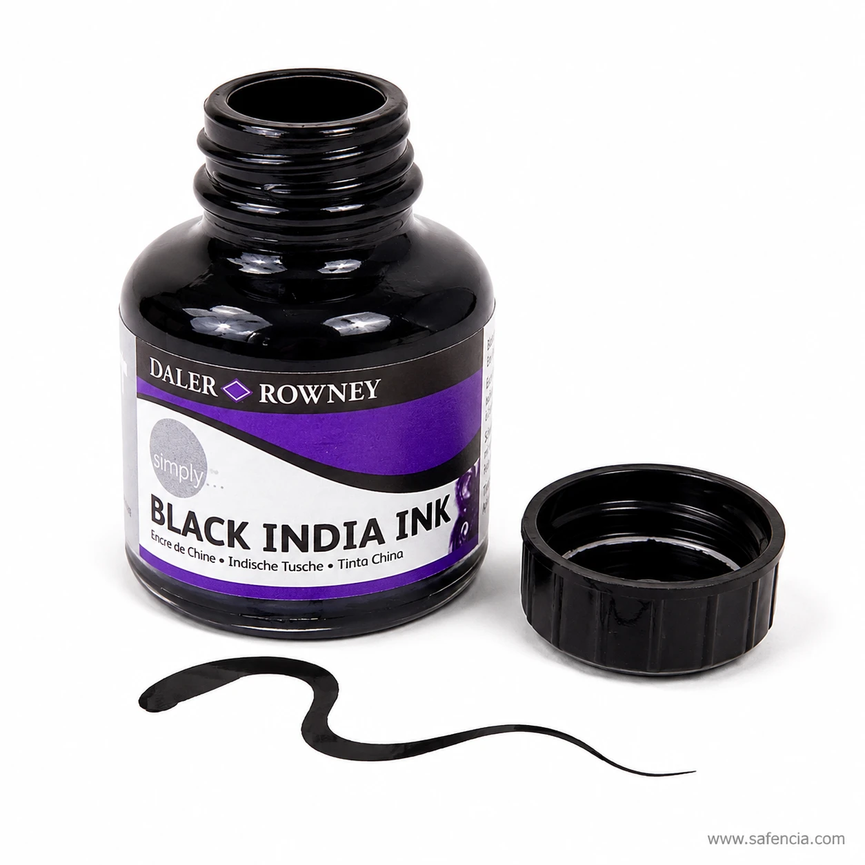 Open India ink jar beside a black brush stroke tapering to a hairline