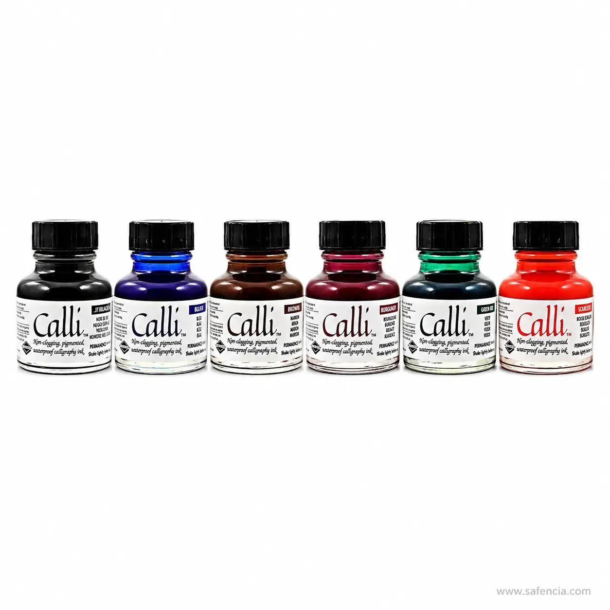A row of Daler-Rowney Calli 29.5ml calligraphy ink bottles showing the colour of the ink through the glass