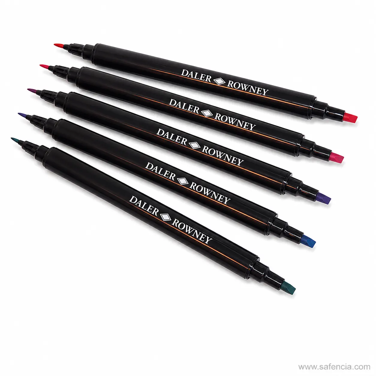 Calligraphy markers laid out showing the chisel tip and brush tip at each end