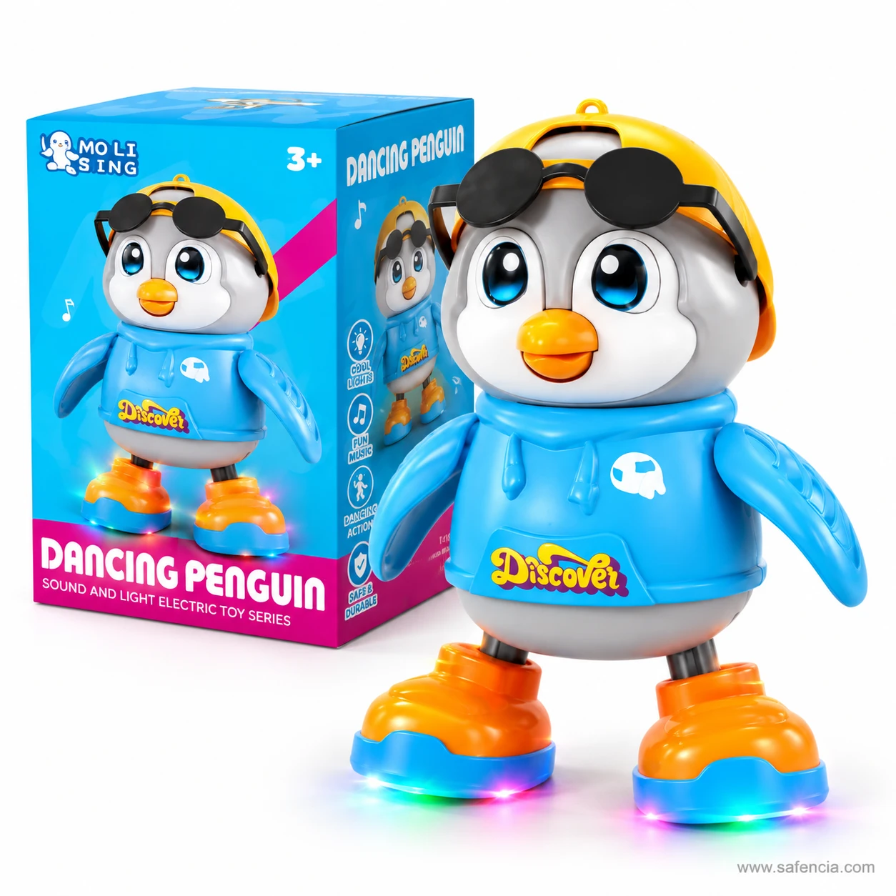 Dancing penguin toy in front of its Dancing Penguin sound and light toy box marked 3 plus