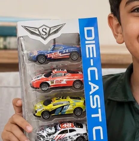 Close-up of blue, red and yellow die-cast pull back race cars with racing decals