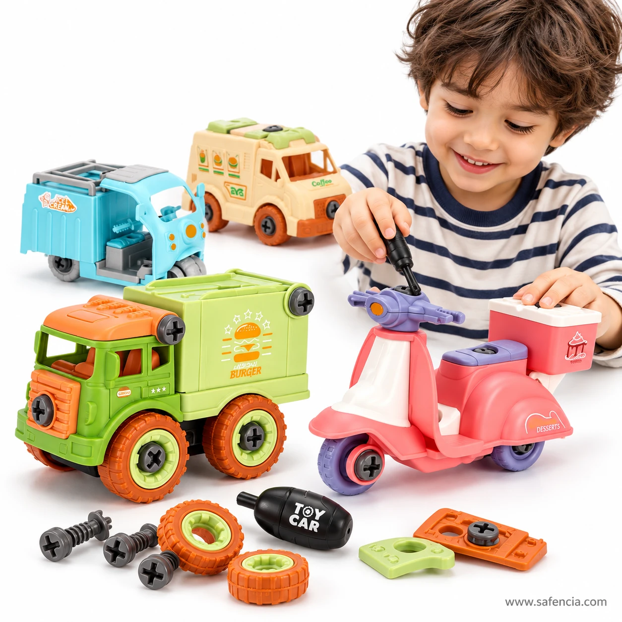 Smiling boy using the toy screwdriver on the pink dessert scooter, with the burger truck, ice cream truck and coffee van nearby