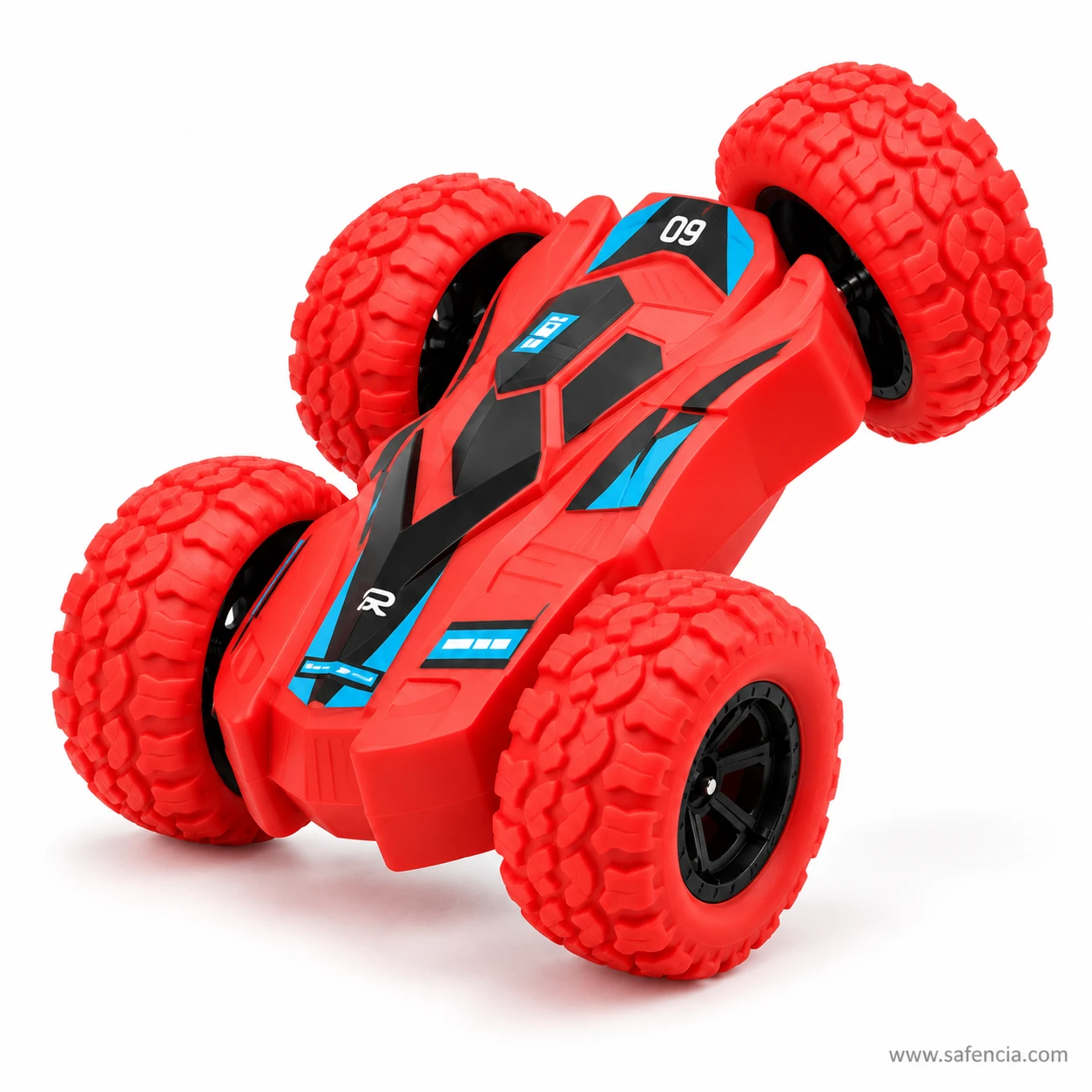 Red double sided stunt car tipped up on two wheels in the middle of a flip, showing that its underside matches its top