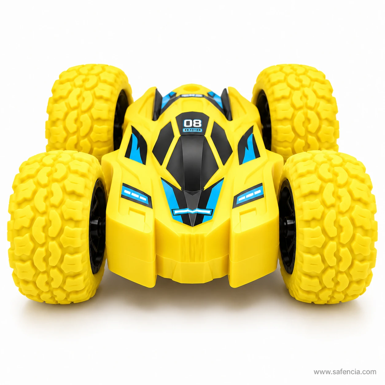 Front view of the yellow double sided stunt car showing its pointed nose and the giant tyres standing wider than the body