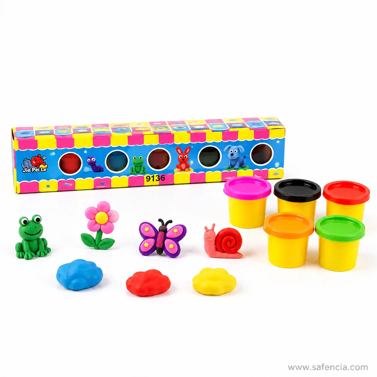 Slim printed dough clay carton with five round windows beside clay tubs and loose modelling lumps