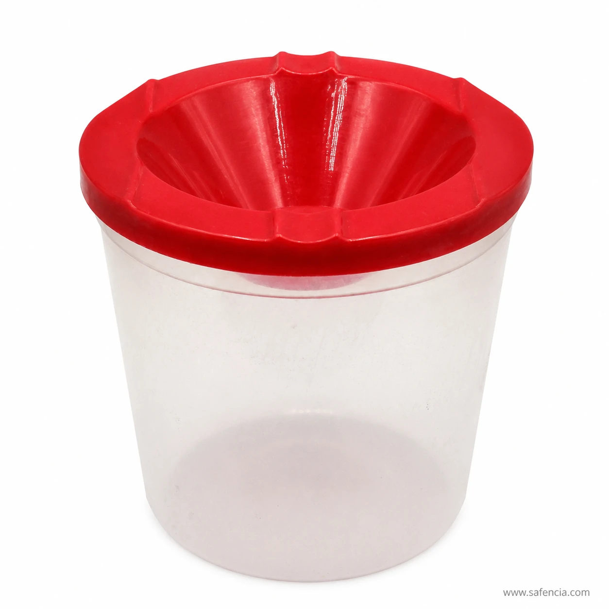 Close view into the ribbed red funnel of the brush cleaning pot