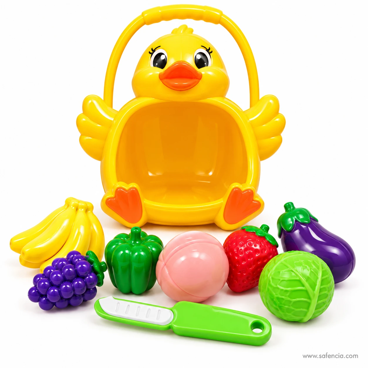 Duck basket cutting set contents laid out: banana, grapes, green pepper, peach, strawberry, aubergine, cabbage and knife