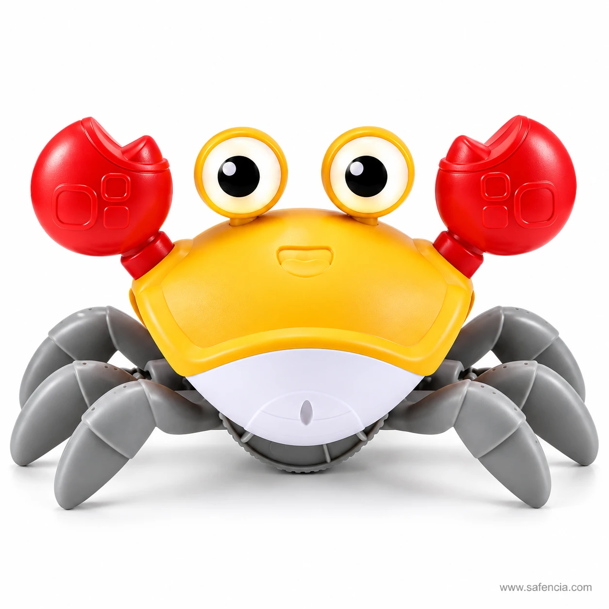 Front view of the yellow electric crawling crab toy showing its eyes, red claws and eight grey legs