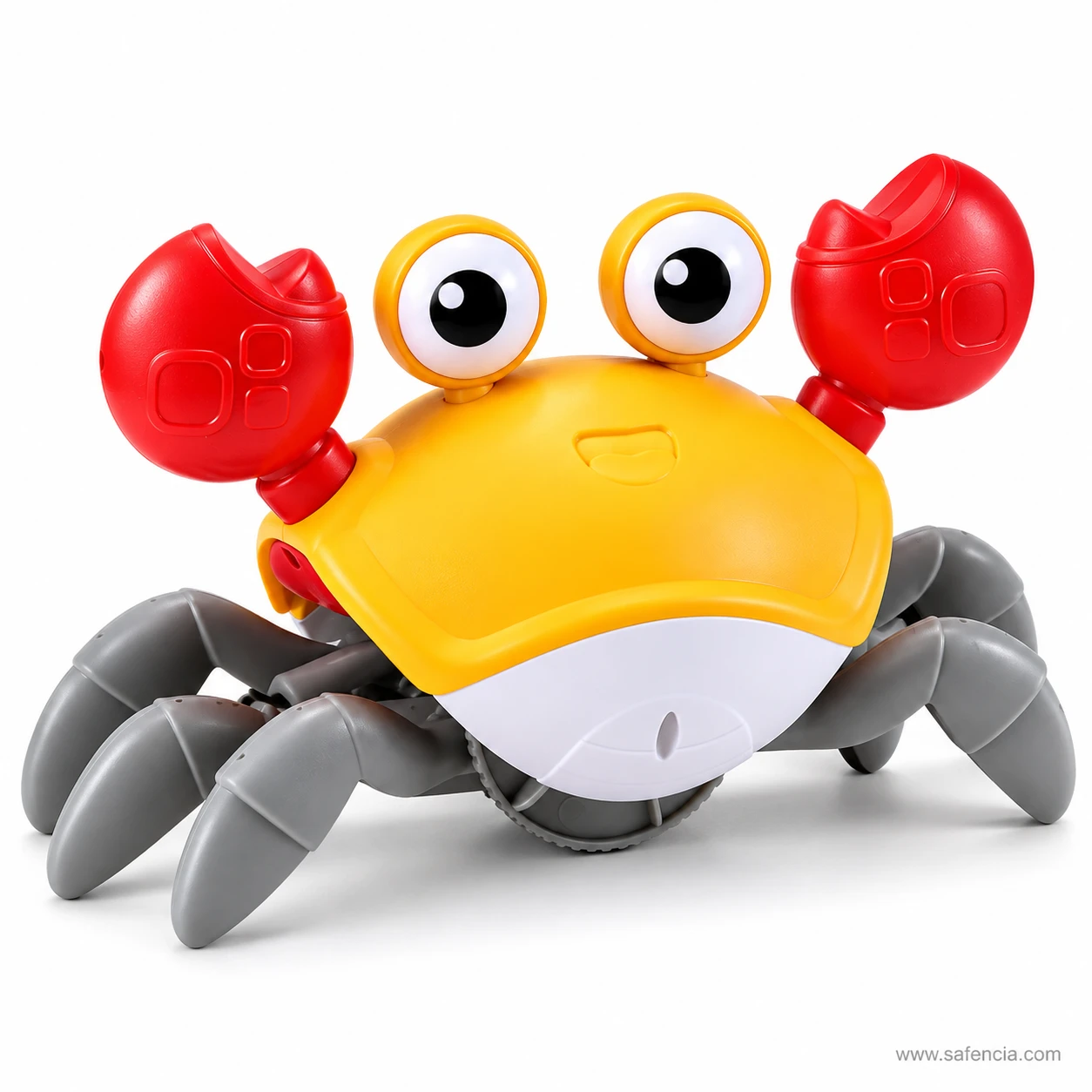 Side angle of the yellow electric crawling crab toy with raised red claws and the wheel underneath