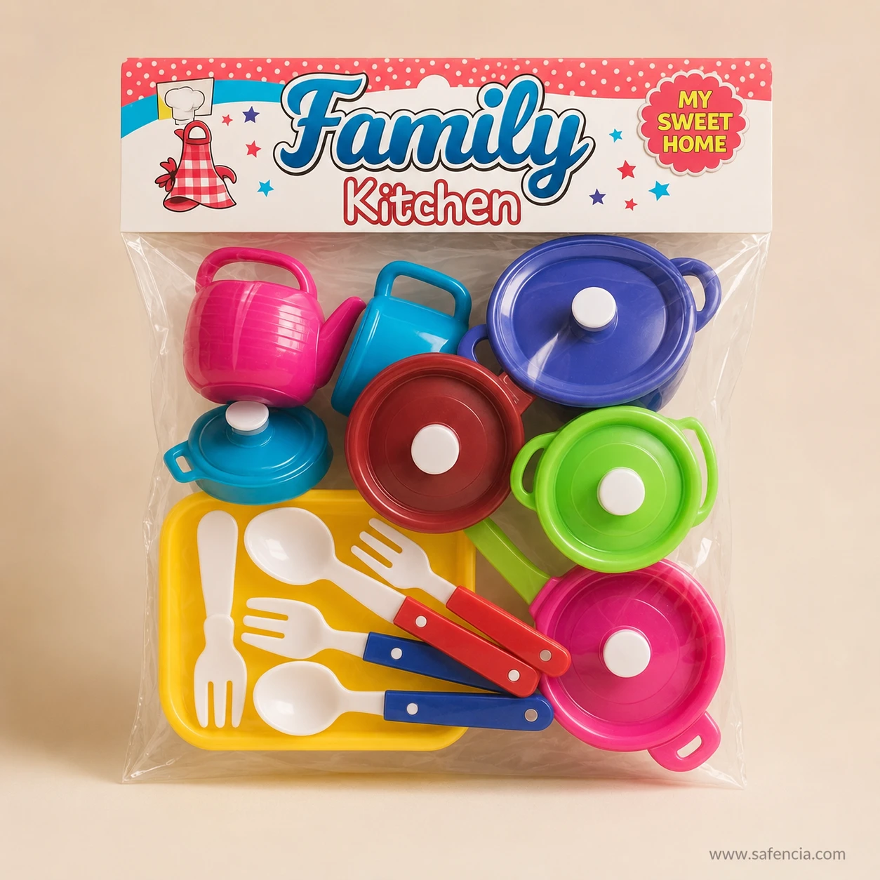 Sealed Family Kitchen polybag containing coloured lidded pots, a pink kettle, cutlery and a yellow serving tray