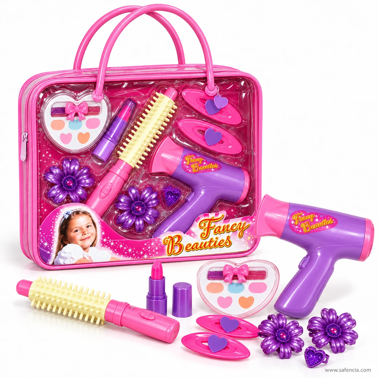 Fancy Beauties set with the dryer, curling brush, palette, lipstick, oval clips, flower clips and ring laid out