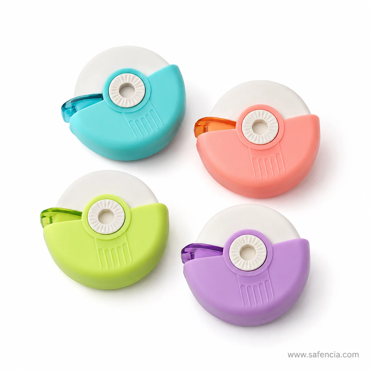 Four eraser sharpeners in teal, coral, lime and purple laid flat showing their translucent swing covers and centre hubs