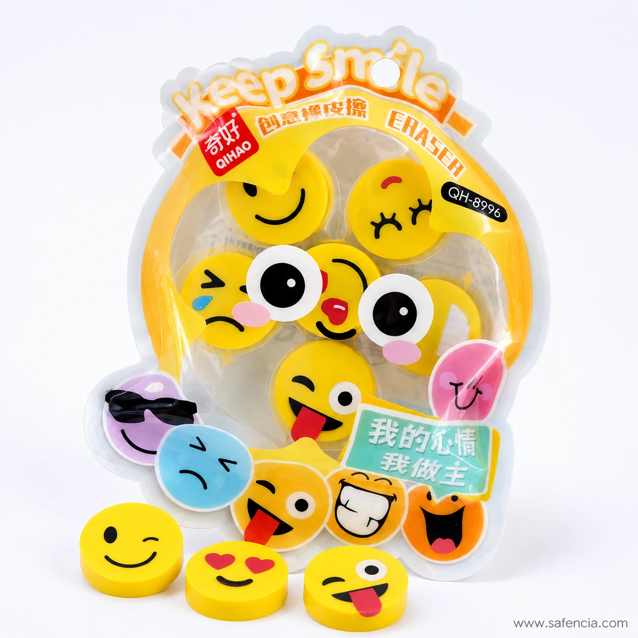 Keep Smile pouch standing with three emoji face erasers in front showing wink, heart eyes and tongue-out expressions