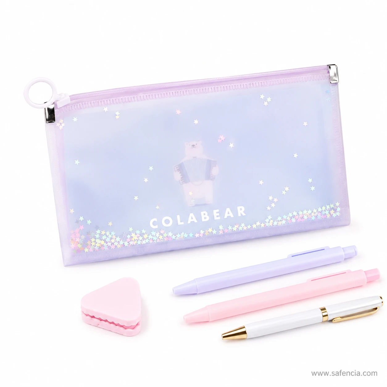 Colabear frosted pencil pouch lying flat beside pens and a rubber