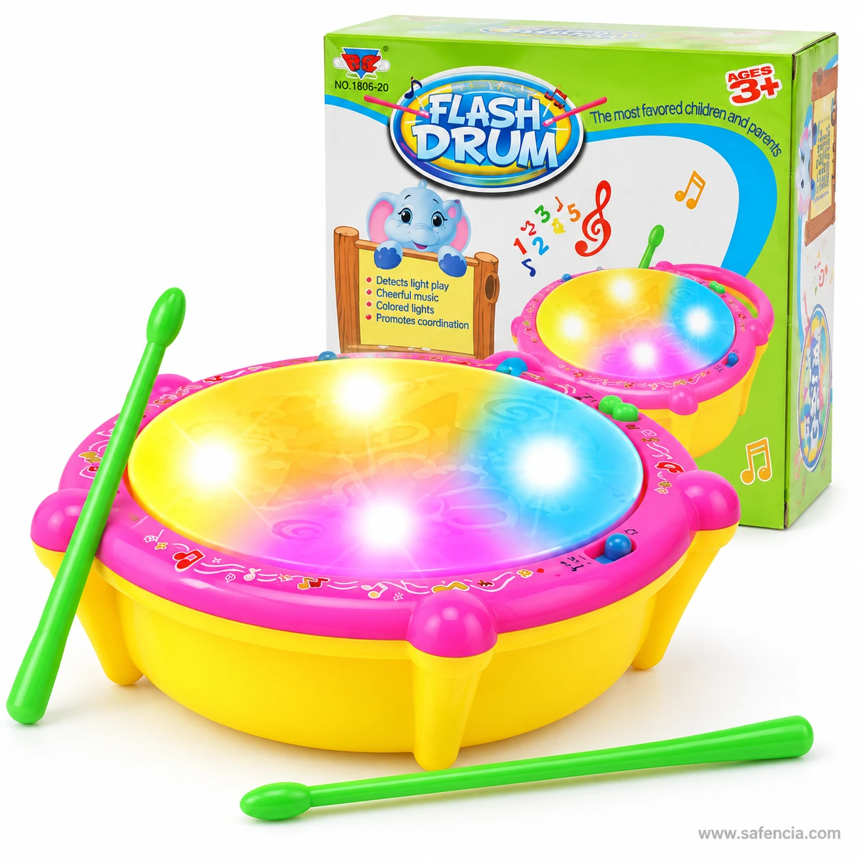 Flash drum toy with a green drumstick resting on the glowing drum head beside its box