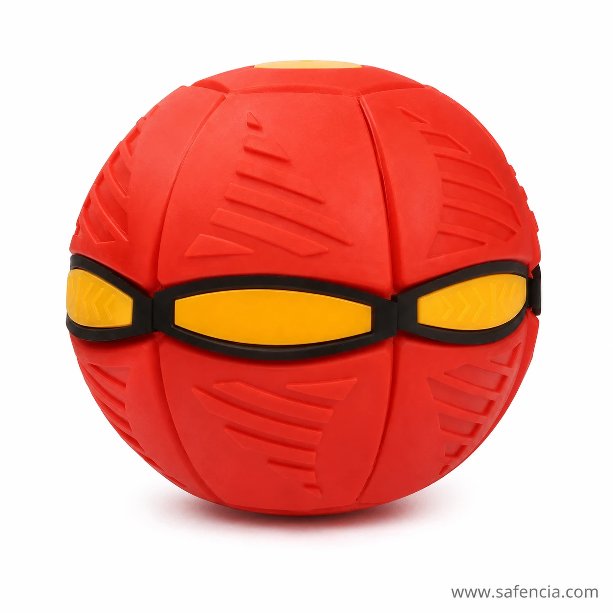 Red flying throw disc ball toy in its closed ball form ready to be caught