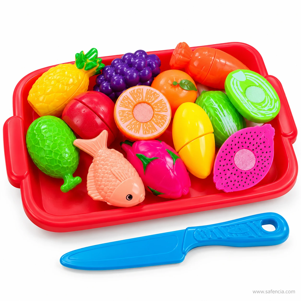 Side angle of the red fruit and fish cutting tray showing the dragon fruit, mango, fish and orange half