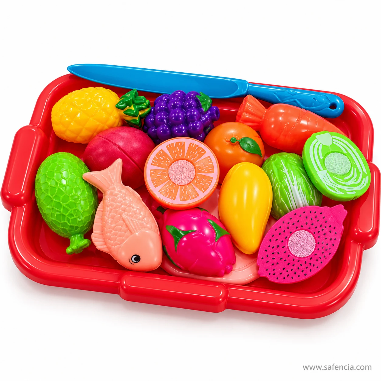 Fruit and fish cutting set tray at an angle with the blue toy knife resting along the back edge