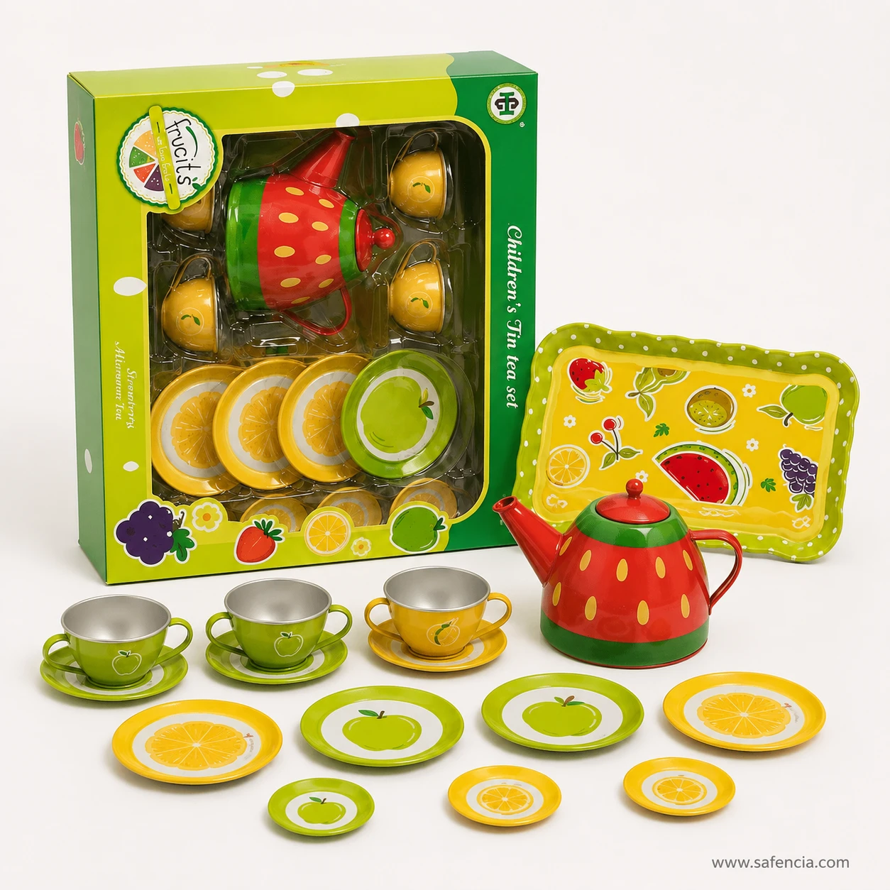 Fruit tin tea set beside its green window box labelled Children's Tin tea set with the tray alongside