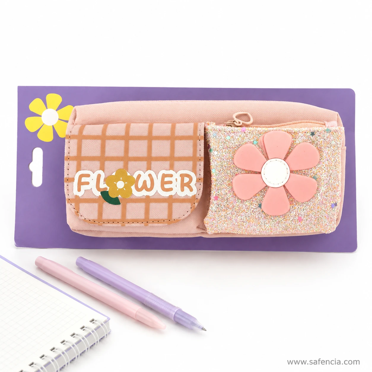 Flower waffle pencil pouch beside an open notebook and pastel pens