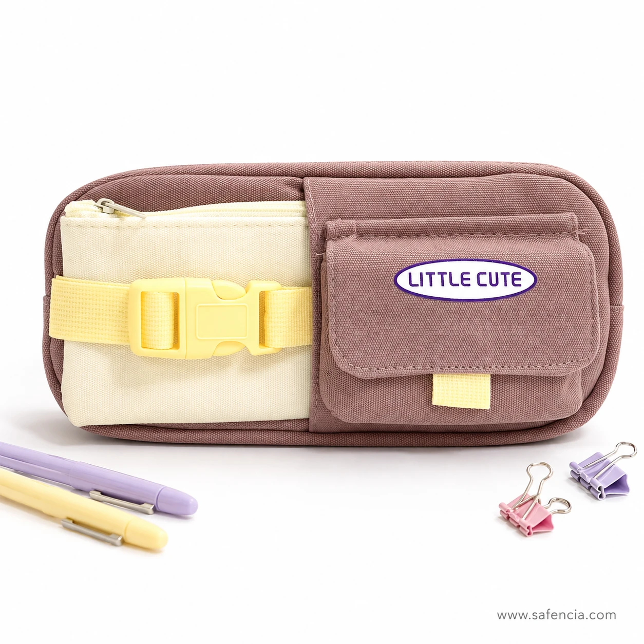 Little Cute buckle pouch beside pastel pens and paper clips for scale