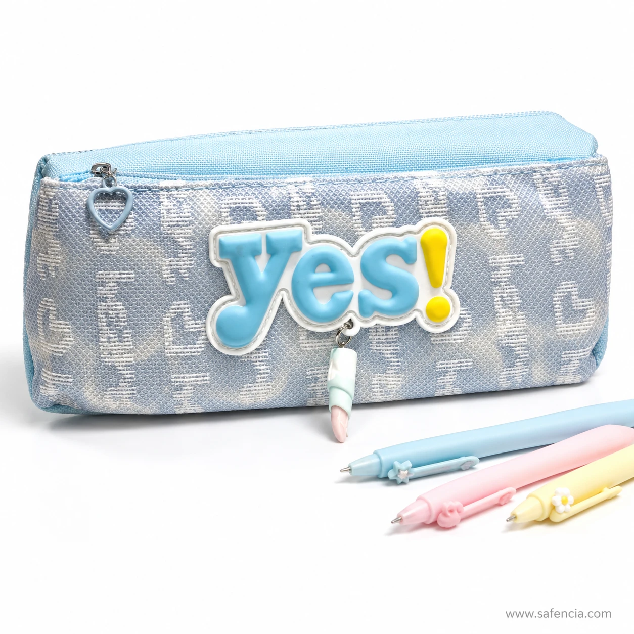 Yes denim-look pencil pouch photographed beside pastel pens for scale